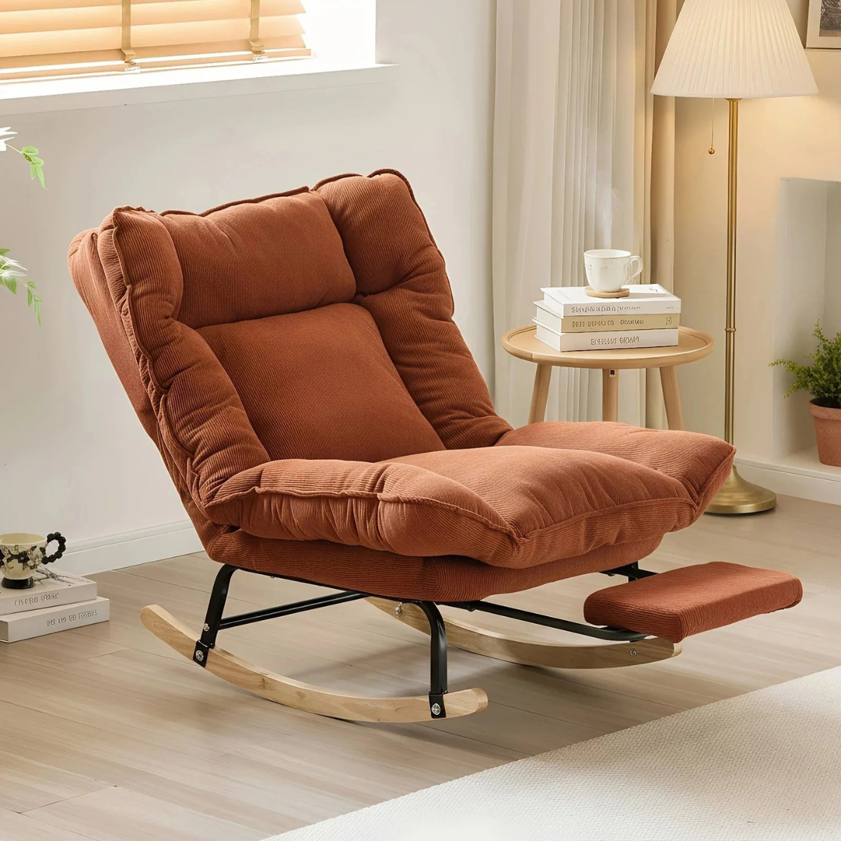 Brown recliner chair with footrest in a living room setting