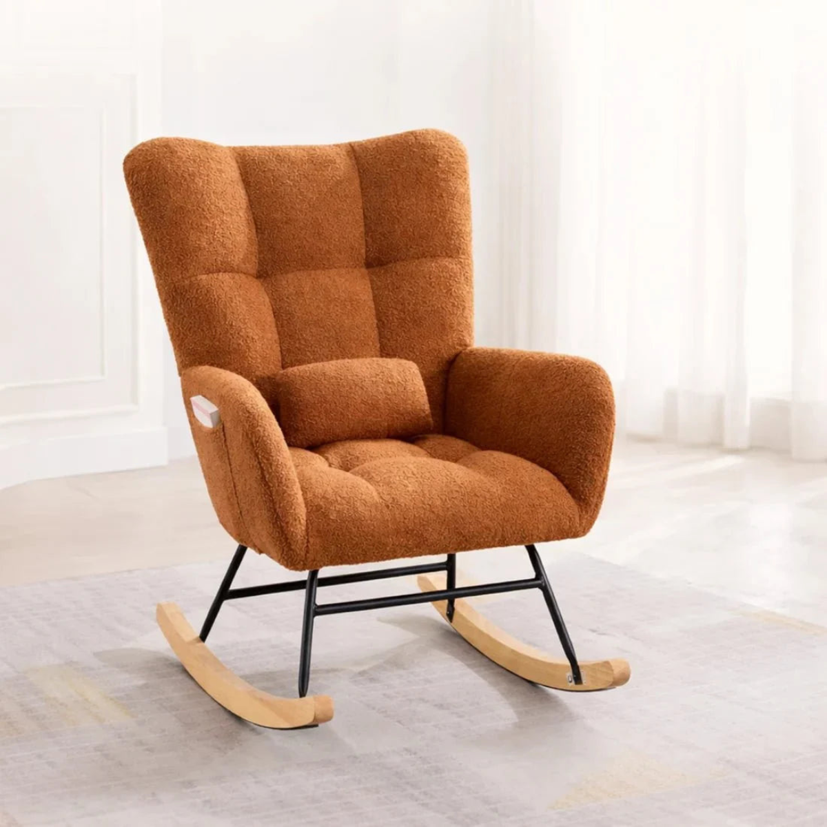 Brown rocking chair in a room with white walls and light-colored floor.