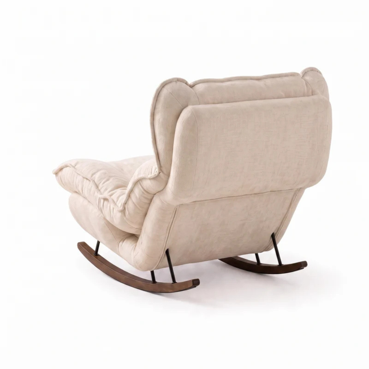 A cream-colored upholstered rocking chair with a high back and dark brown wooden rockers, shown from a three-quarters angle on a white background.