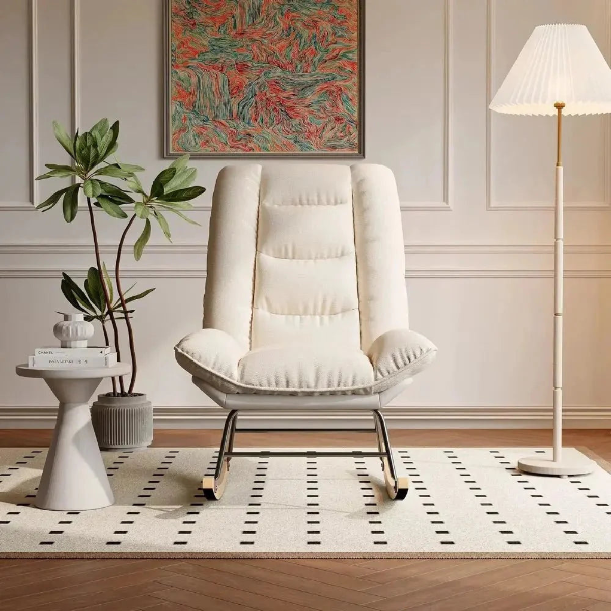 Modern living room with a cream armchair, side table, and decorative elements.