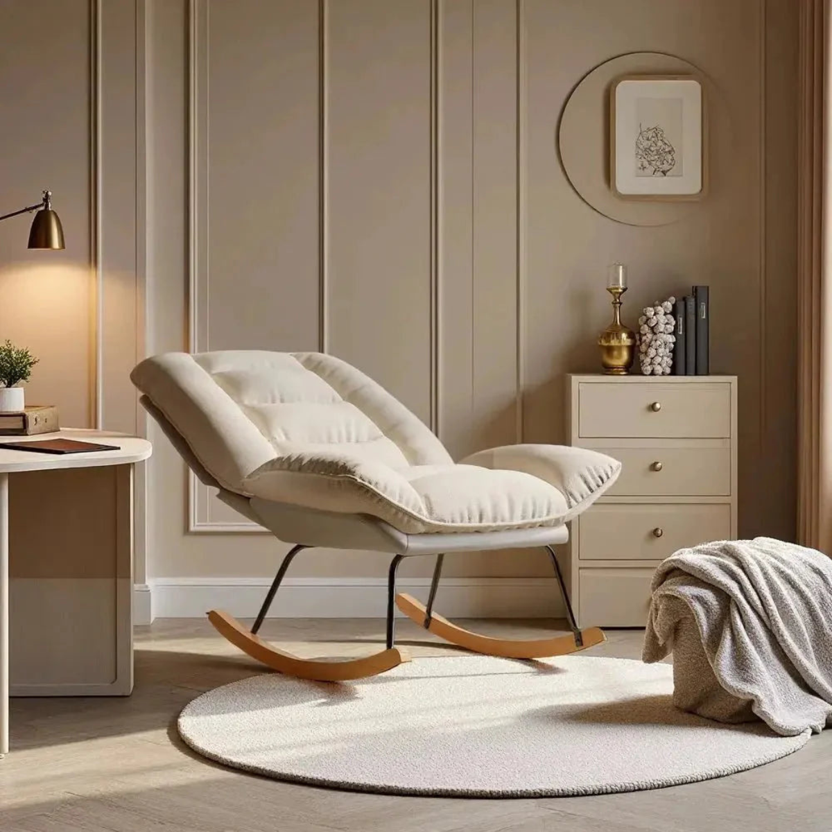 Modern interior with a cream-colored rocking chair, side table, and decorative items.