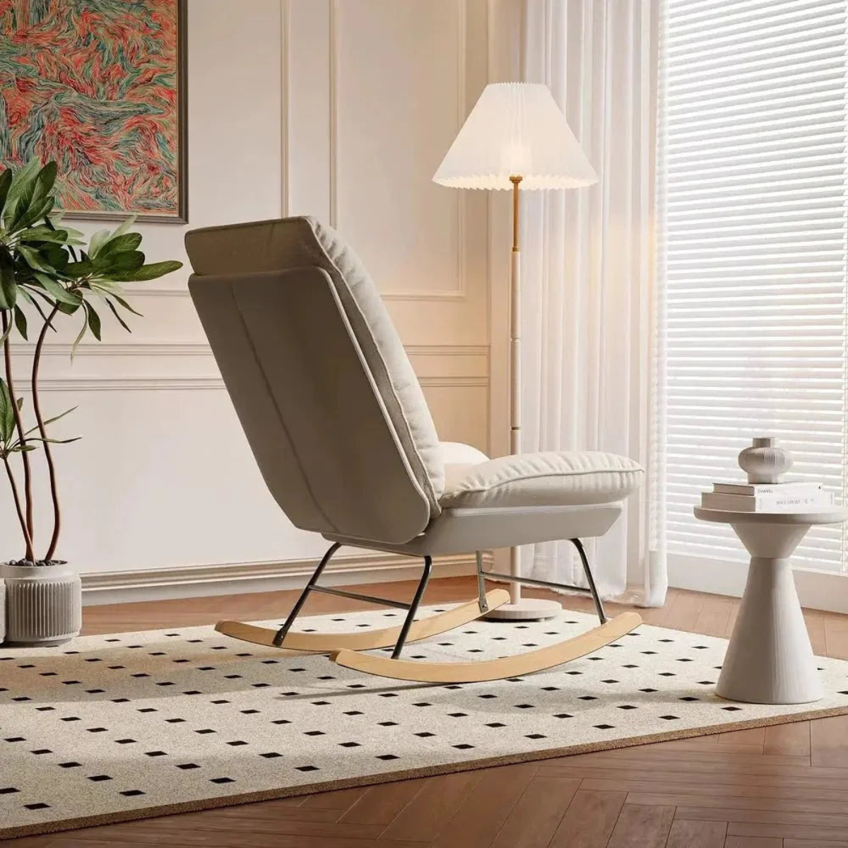 Modern rocking chair in a stylish living room with a lamp and plant.