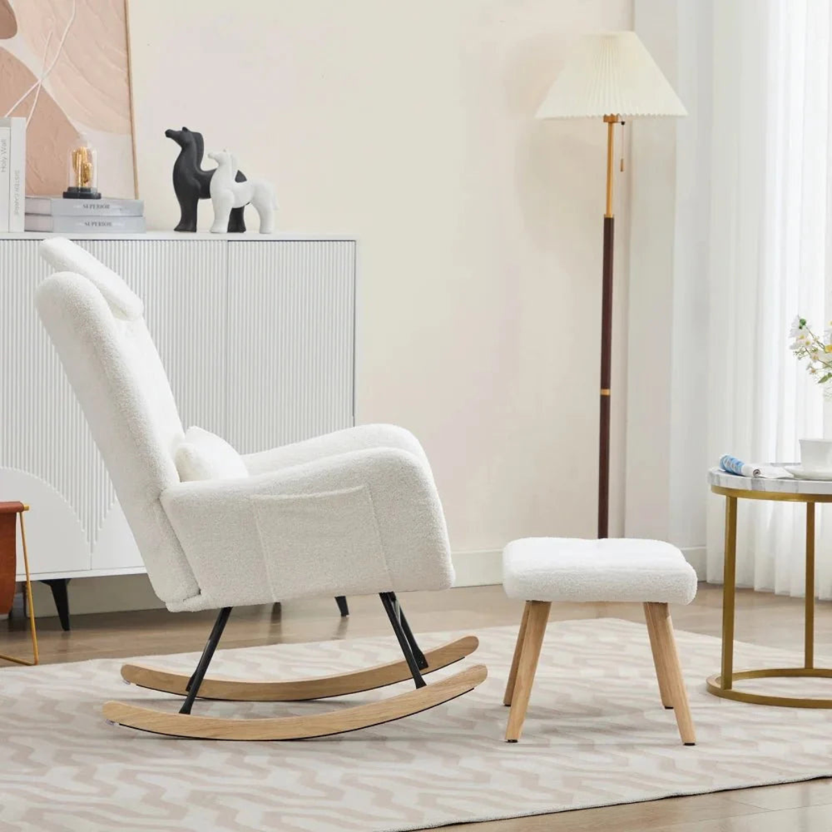 White rocking chair with ottoman in a modern living room setting
