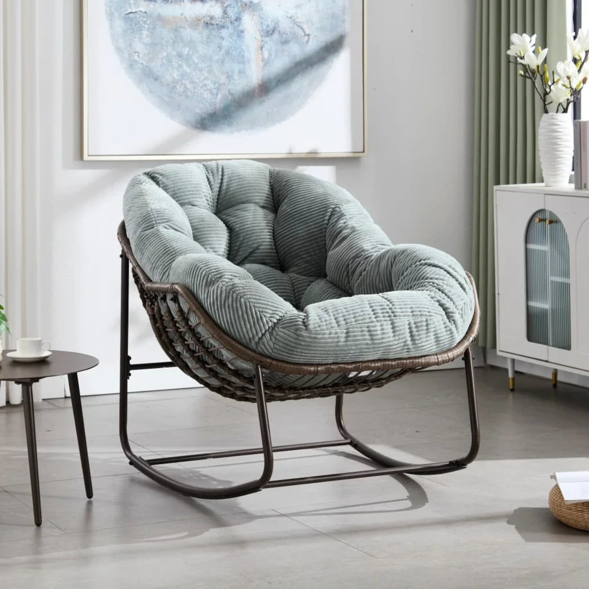 Rattan chair with a large cushion in a modern living room setting