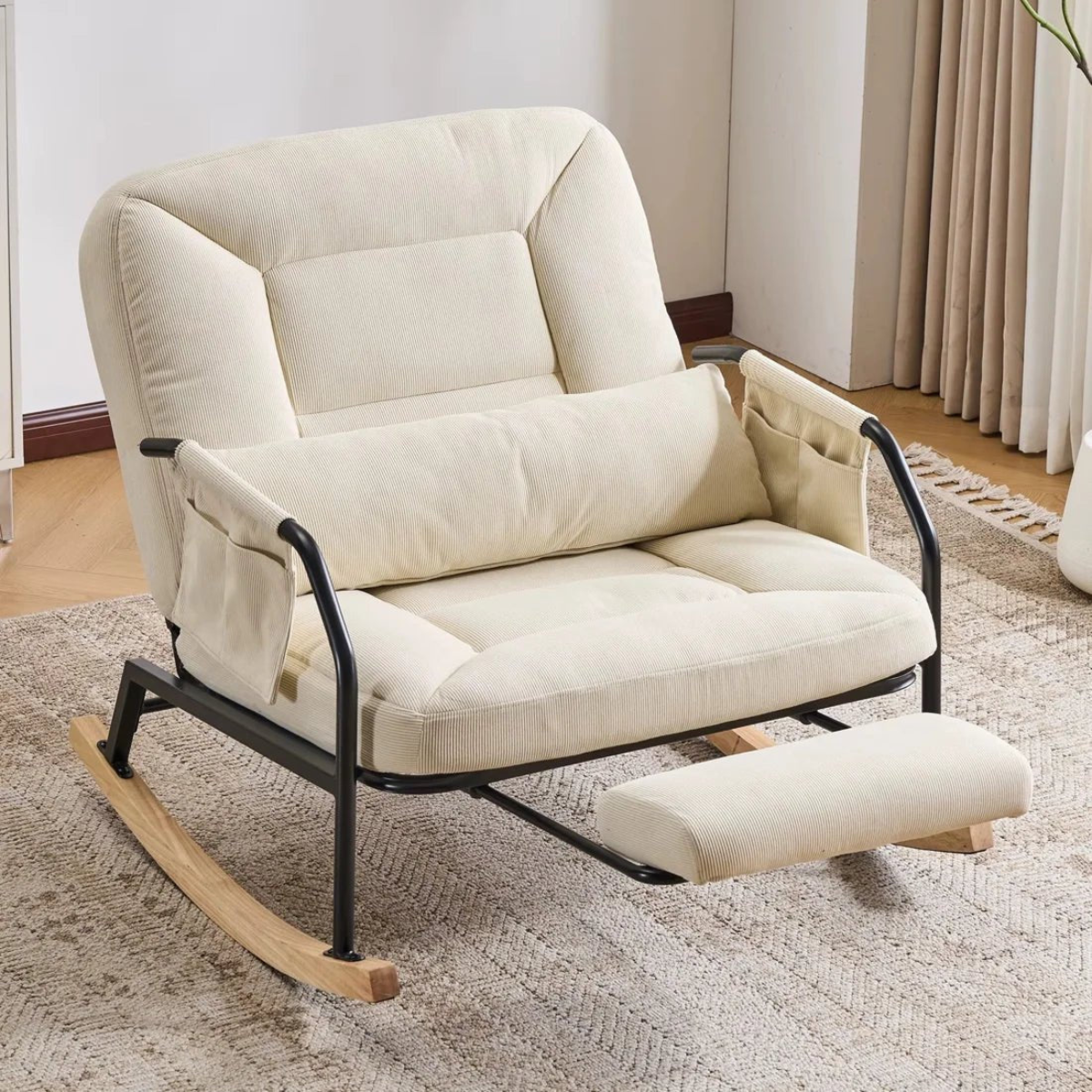 Beige rocking chair with wooden footrest in a room setting