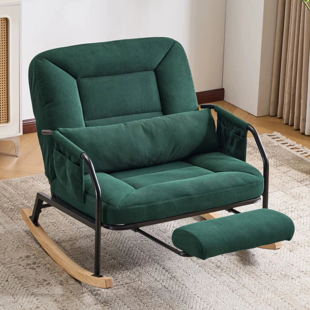 A dark green velvet recliner chair with a matching footrest and a black metal frame, set on a textured beige rug in a room with light-colored walls and curtains.