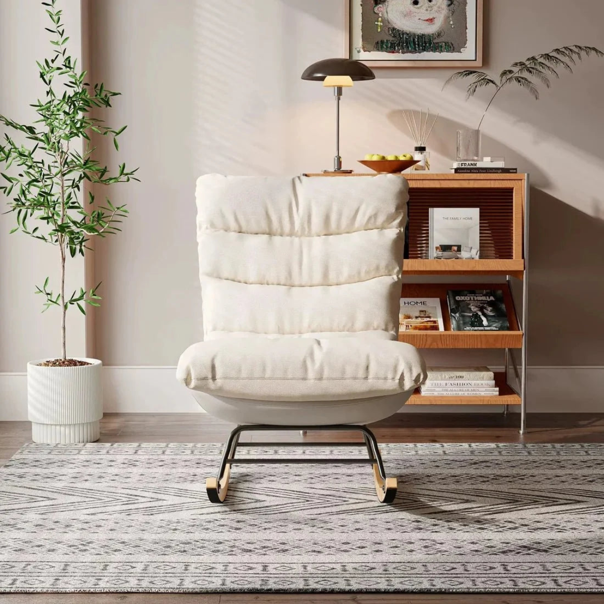 White armchair in a living room with a bookshelf and decorative items.