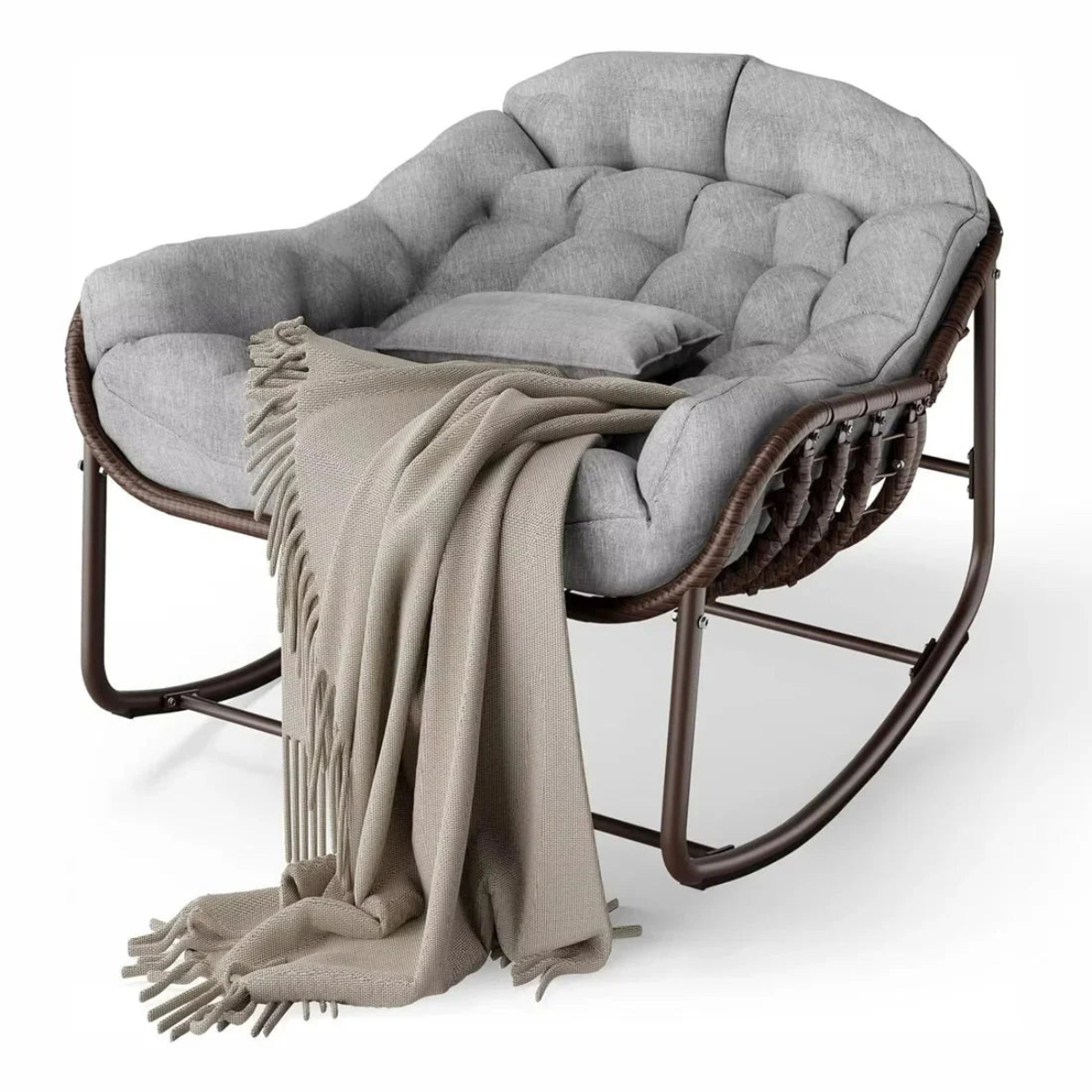 Gray cushioned chair with a beige blanket on a white background