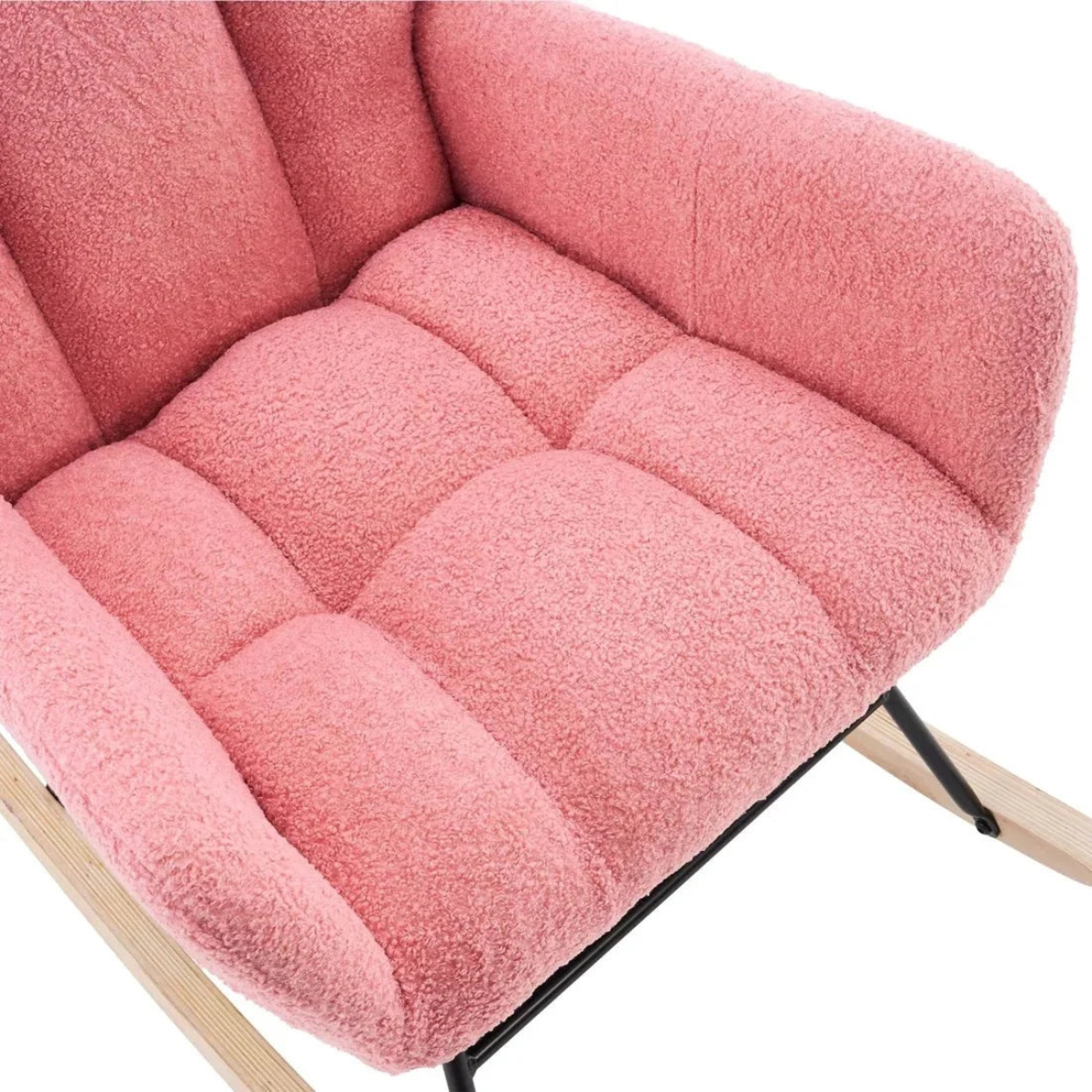 Close-up of a pink cushioned chair with wooden legs on a white background